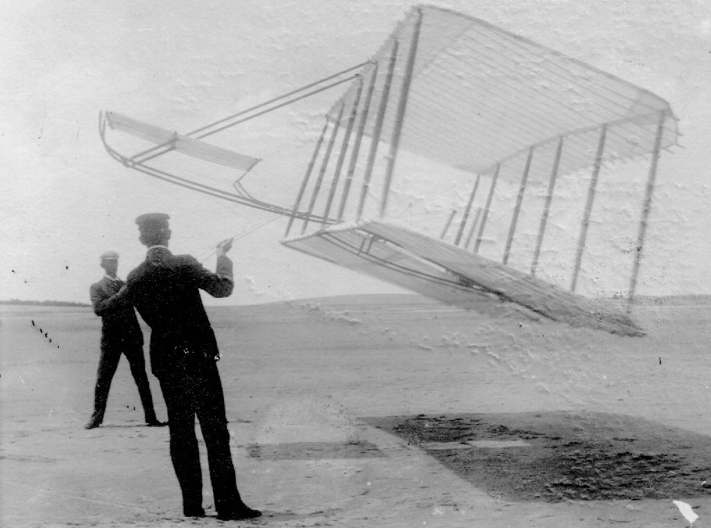 photograph of Wright brothers with glider.